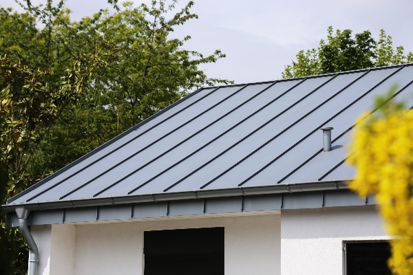 A building is protected by its metal roof.