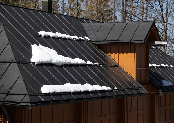 A home with a metal roof will get through the winter much more easily.